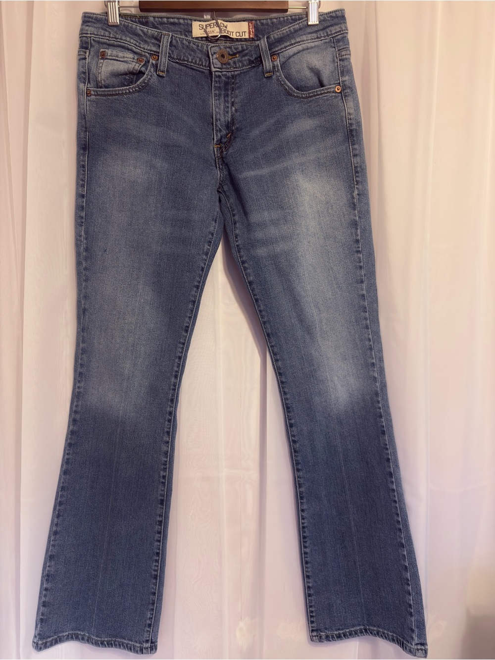 Levi’s Size 11 Long Super Low Medium Wash Blue Women's Bootcut Jeans 518